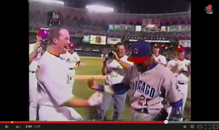 Mark McGwire breaks Roger Maris record. He is congratulated by home run rival Sammy Sosa.